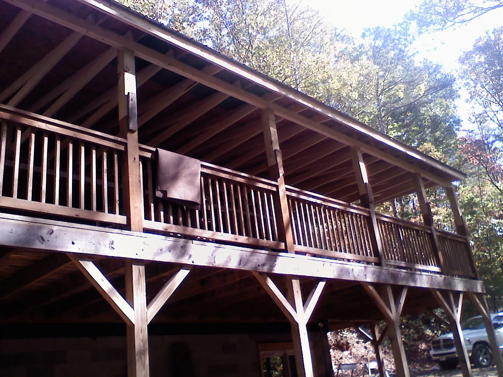 Timber framing under a new elevated porch and deck — Roof Leak Repair in Fairhope by Roofing Brothers